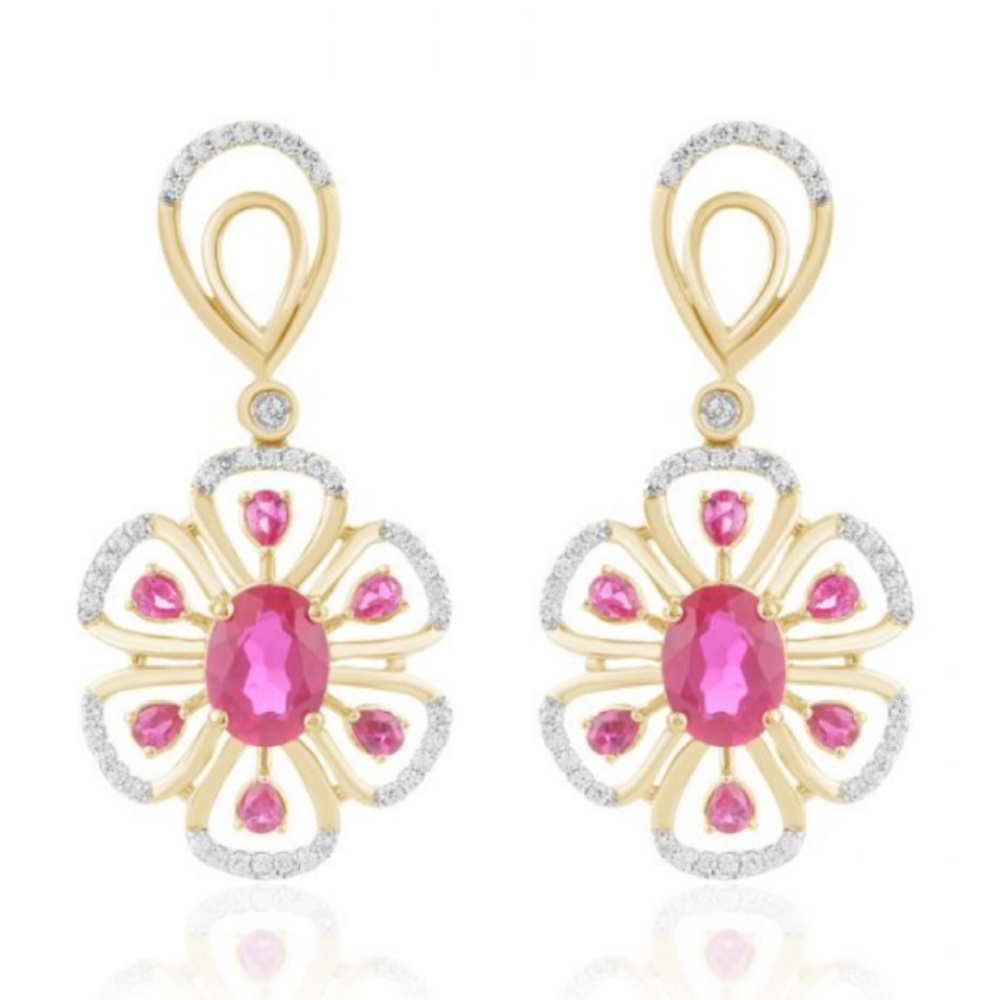 18 k gold 3.9 ctw diamond earrings.